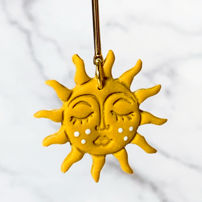 close up sun earrings