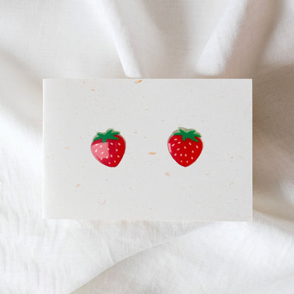 strawberry earrings on card