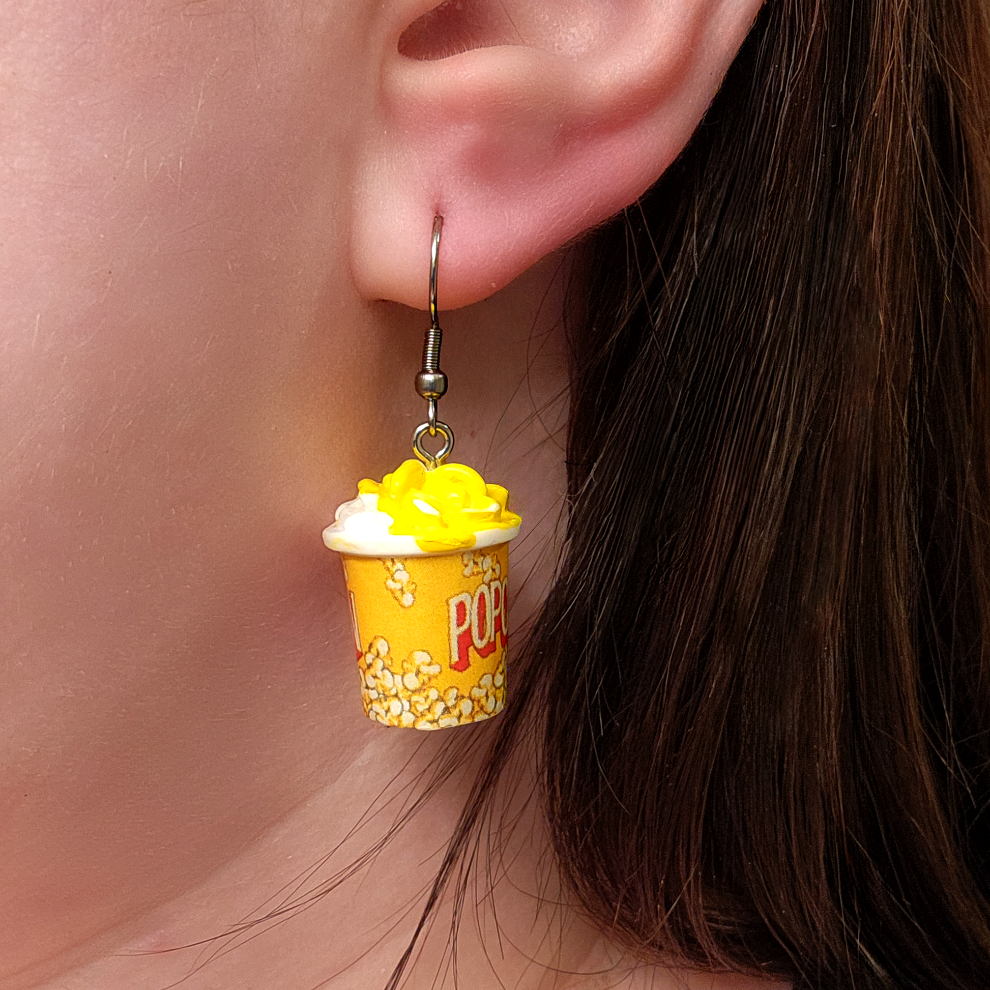 woman wearing popcorn earrings