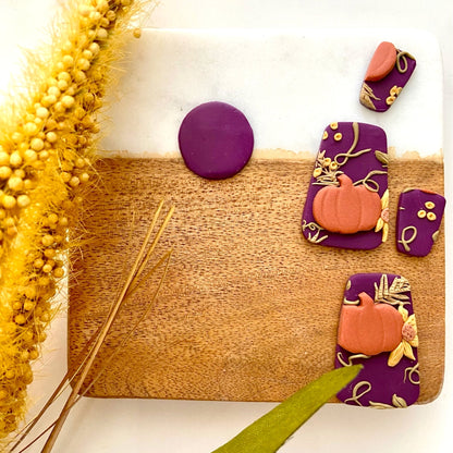 purple statement pumpkin earrings